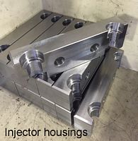 Injector Housings